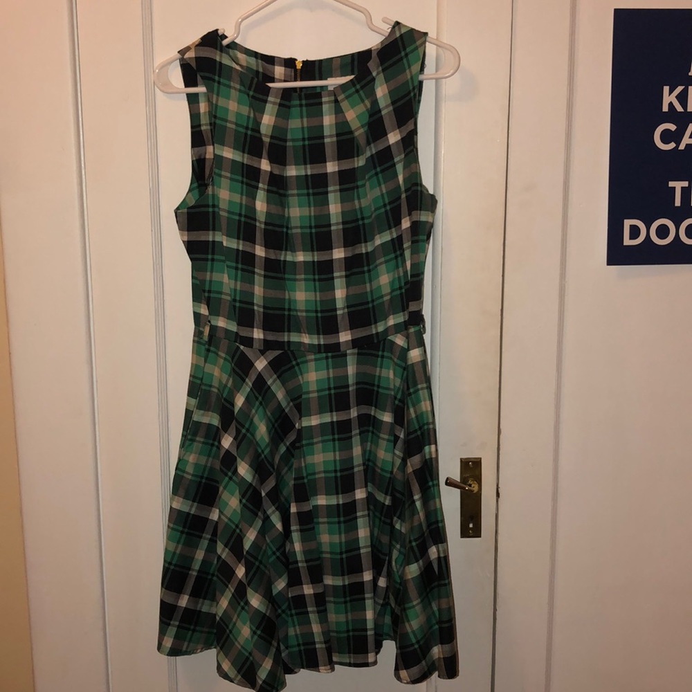 Green tartan fit and flair dress.